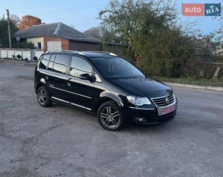 Черный Фольксваген Туран, объемом двигателя 1.4 л и пробегом 238 тыс. км за 7888 $, фото 190 на Automoto.ua