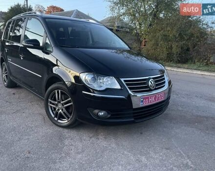 Черный Фольксваген Туран, объемом двигателя 1.4 л и пробегом 238 тыс. км за 7888 $, фото 193 на Automoto.ua