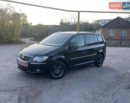 Черный Фольксваген Туран, объемом двигателя 1.4 л и пробегом 238 тыс. км за 7888 $, фото 109 на Automoto.ua