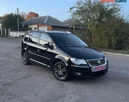 Черный Фольксваген Туран, объемом двигателя 1.4 л и пробегом 238 тыс. км за 7888 $, фото 191 на Automoto.ua
