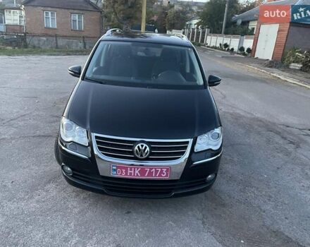 Черный Фольксваген Туран, объемом двигателя 1.4 л и пробегом 238 тыс. км за 7888 $, фото 111 на Automoto.ua