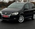 Черный Фольксваген Туран, объемом двигателя 2 л и пробегом 260 тыс. км за 9950 $, фото 1 на Automoto.ua