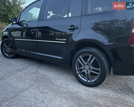 Черный Фольксваген Туран, объемом двигателя 1.4 л и пробегом 238 тыс. км за 7888 $, фото 13 на Automoto.ua