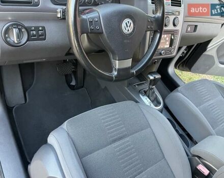 Черный Фольксваген Туран, объемом двигателя 1.4 л и пробегом 238 тыс. км за 7888 $, фото 56 на Automoto.ua