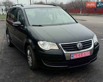 Черный Фольксваген Туран, объемом двигателя 1.6 л и пробегом 249 тыс. км за 7999 $, фото 25 на Automoto.ua