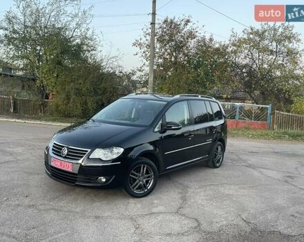 Черный Фольксваген Туран, объемом двигателя 1.4 л и пробегом 238 тыс. км за 7888 $, фото 15 на Automoto.ua
