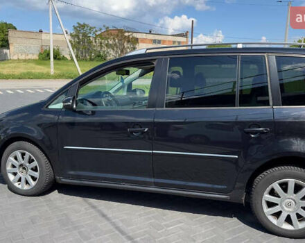 Черный Фольксваген Туран, объемом двигателя 1.97 л и пробегом 285 тыс. км за 7100 $, фото 5 на Automoto.ua