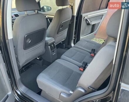 Черный Фольксваген Туран, объемом двигателя 1.4 л и пробегом 238 тыс. км за 7888 $, фото 142 на Automoto.ua