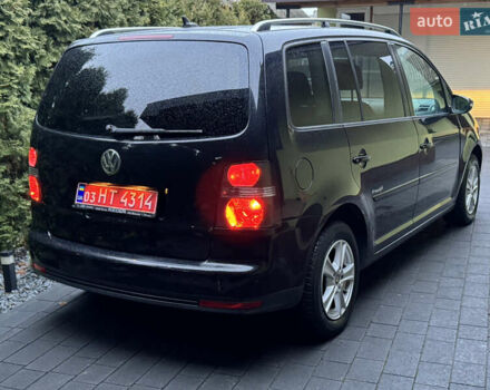 Черный Фольксваген Туран, объемом двигателя 1.6 л и пробегом 191 тыс. км за 7900 $, фото 5 на Automoto.ua