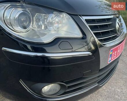 Черный Фольксваген Туран, объемом двигателя 1.4 л и пробегом 238 тыс. км за 7888 $, фото 22 на Automoto.ua