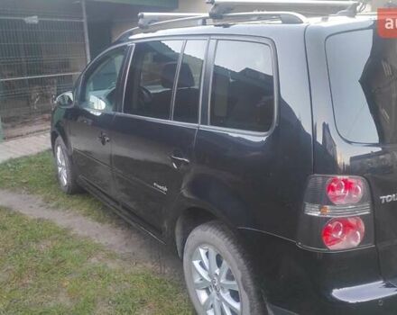 Черный Фольксваген Туран, объемом двигателя 1.39 л и пробегом 207 тыс. км за 7788 $, фото 4 на Automoto.ua