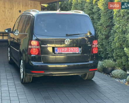 Черный Фольксваген Туран, объемом двигателя 1.4 л и пробегом 199 тыс. км за 7999 $, фото 6 на Automoto.ua