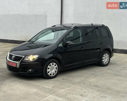 Черный Фольксваген Туран, объемом двигателя 1.4 л и пробегом 213 тыс. км за 8100 $, фото 86 на Automoto.ua