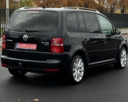 Черный Фольксваген Туран, объемом двигателя 2 л и пробегом 260 тыс. км за 9950 $, фото 3 на Automoto.ua