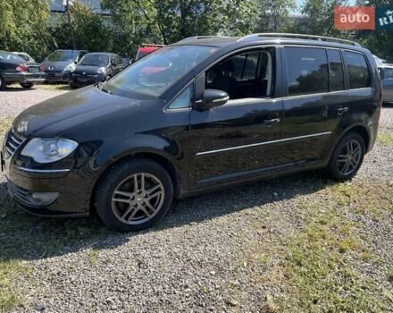 Черный Фольксваген Туран, объемом двигателя 1.4 л и пробегом 238 тыс. км за 7888 $, фото 261 на Automoto.ua