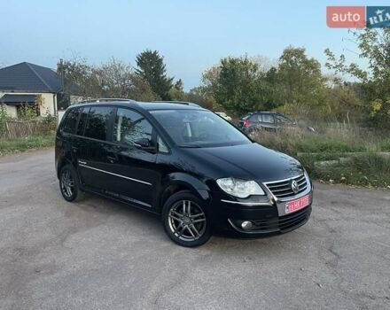 Черный Фольксваген Туран, объемом двигателя 1.4 л и пробегом 238 тыс. км за 7888 $, фото 96 на Automoto.ua
