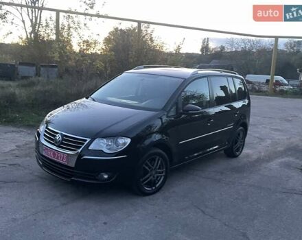 Черный Фольксваген Туран, объемом двигателя 1.4 л и пробегом 238 тыс. км за 7888 $, фото 9 на Automoto.ua