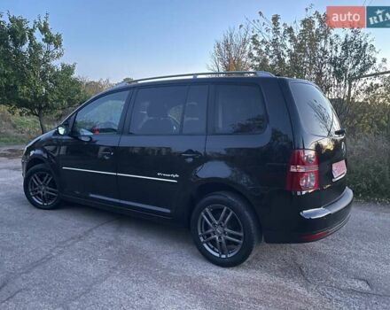 Черный Фольксваген Туран, объемом двигателя 1.4 л и пробегом 238 тыс. км за 7888 $, фото 14 на Automoto.ua