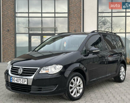 Чорний Фольксваген Туран, об'ємом двигуна 1.97 л та пробігом 336 тис. км за 8200 $, фото 1 на Automoto.ua