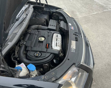 Черный Фольксваген Туран, объемом двигателя 1.4 л и пробегом 213 тыс. км за 8100 $, фото 59 на Automoto.ua