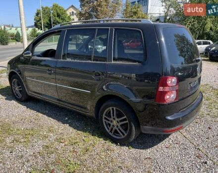 Черный Фольксваген Туран, объемом двигателя 1.4 л и пробегом 238 тыс. км за 7888 $, фото 262 на Automoto.ua