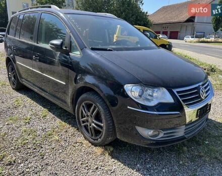 Черный Фольксваген Туран, объемом двигателя 1.4 л и пробегом 238 тыс. км за 7888 $, фото 259 на Automoto.ua