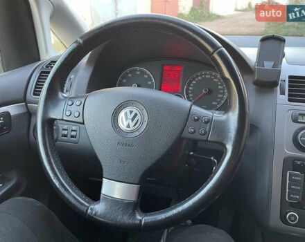 Черный Фольксваген Туран, объемом двигателя 1.4 л и пробегом 238 тыс. км за 7888 $, фото 125 на Automoto.ua