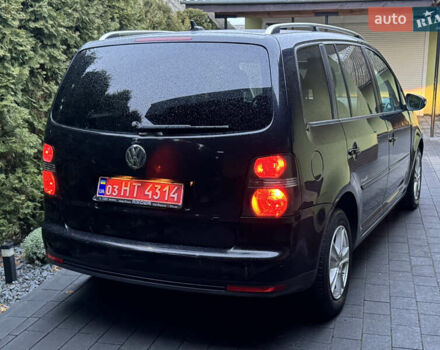 Черный Фольксваген Туран, объемом двигателя 1.6 л и пробегом 191 тыс. км за 7900 $, фото 6 на Automoto.ua