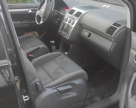 Черный Фольксваген Туран, объемом двигателя 1.39 л и пробегом 207 тыс. км за 7788 $, фото 9 на Automoto.ua