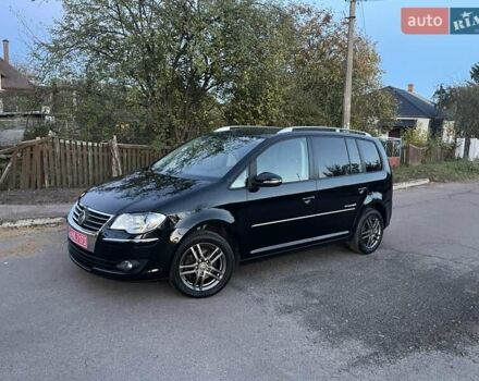 Черный Фольксваген Туран, объемом двигателя 1.4 л и пробегом 238 тыс. км за 7888 $, фото 205 на Automoto.ua