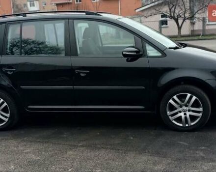 Черный Фольксваген Туран, объемом двигателя 1.6 л и пробегом 249 тыс. км за 7999 $, фото 23 на Automoto.ua