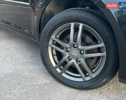 Черный Фольксваген Туран, объемом двигателя 1.4 л и пробегом 238 тыс. км за 7888 $, фото 93 на Automoto.ua