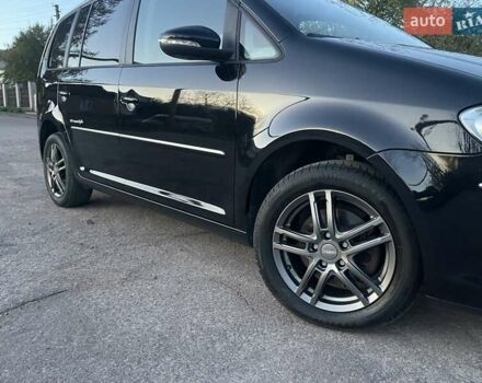 Черный Фольксваген Туран, объемом двигателя 1.4 л и пробегом 238 тыс. км за 7888 $, фото 195 на Automoto.ua
