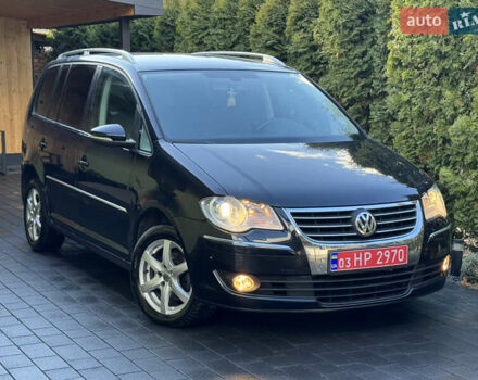 Черный Фольксваген Туран, объемом двигателя 1.4 л и пробегом 199 тыс. км за 7999 $, фото 2 на Automoto.ua
