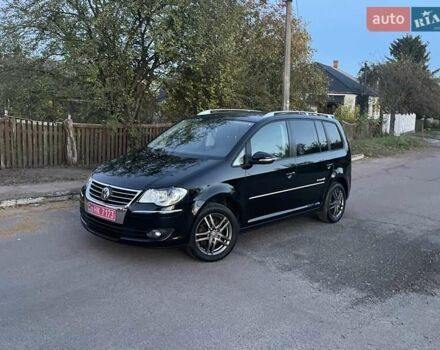 Черный Фольксваген Туран, объемом двигателя 1.4 л и пробегом 238 тыс. км за 7888 $, фото 206 на Automoto.ua