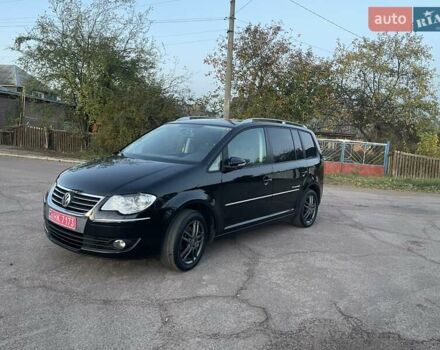 Черный Фольксваген Туран, объемом двигателя 1.4 л и пробегом 238 тыс. км за 7888 $, фото 83 на Automoto.ua