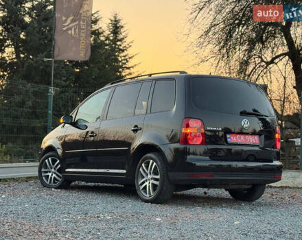 Черный Фольксваген Туран, объемом двигателя 1.6 л и пробегом 215 тыс. км за 7890 $, фото 29 на Automoto.ua
