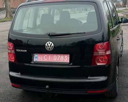 Черный Фольксваген Туран, объемом двигателя 1.6 л и пробегом 249 тыс. км за 7999 $, фото 18 на Automoto.ua
