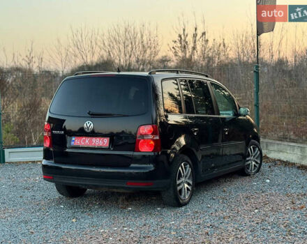Черный Фольксваген Туран, объемом двигателя 1.6 л и пробегом 215 тыс. км за 7890 $, фото 38 на Automoto.ua