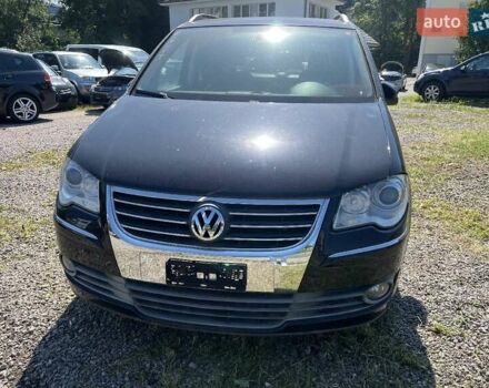 Черный Фольксваген Туран, объемом двигателя 1.4 л и пробегом 238 тыс. км за 7888 $, фото 260 на Automoto.ua