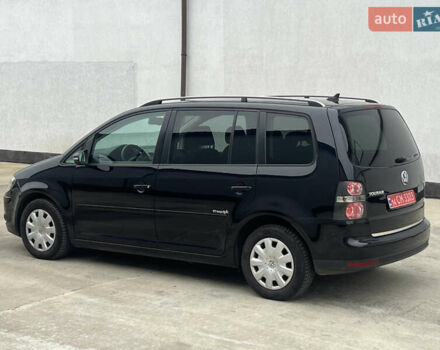 Черный Фольксваген Туран, объемом двигателя 1.4 л и пробегом 213 тыс. км за 8100 $, фото 89 на Automoto.ua