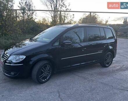 Черный Фольксваген Туран, объемом двигателя 1.4 л и пробегом 238 тыс. км за 7888 $, фото 12 на Automoto.ua