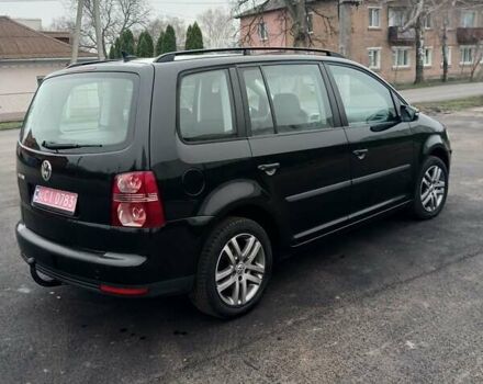 Черный Фольксваген Туран, объемом двигателя 1.6 л и пробегом 249 тыс. км за 7999 $, фото 20 на Automoto.ua