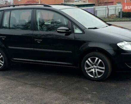 Черный Фольксваген Туран, объемом двигателя 1.6 л и пробегом 249 тыс. км за 7999 $, фото 24 на Automoto.ua