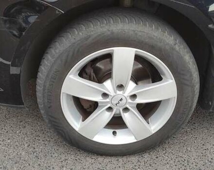 Черный Фольксваген Туран, объемом двигателя 1.39 л и пробегом 195 тыс. км за 8300 $, фото 31 на Automoto.ua