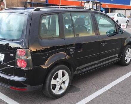 Черный Фольксваген Туран, объемом двигателя 1.39 л и пробегом 195 тыс. км за 8300 $, фото 4 на Automoto.ua