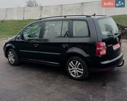 Черный Фольксваген Туран, объемом двигателя 1.6 л и пробегом 249 тыс. км за 7999 $, фото 13 на Automoto.ua