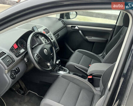 Черный Фольксваген Туран, объемом двигателя 1.4 л и пробегом 213 тыс. км за 8100 $, фото 47 на Automoto.ua