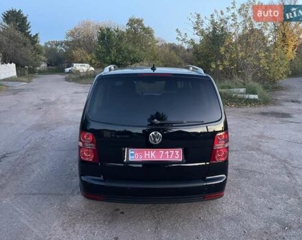 Черный Фольксваген Туран, объемом двигателя 1.4 л и пробегом 238 тыс. км за 7888 $, фото 118 на Automoto.ua