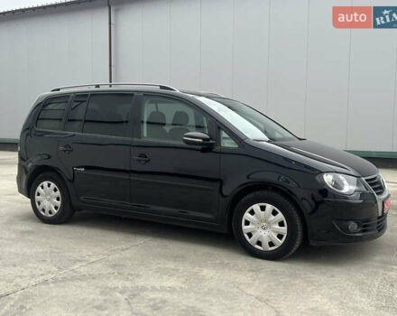 Черный Фольксваген Туран, объемом двигателя 1.4 л и пробегом 213 тыс. км за 8100 $, фото 20 на Automoto.ua